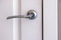 Closed white interroom door with handle