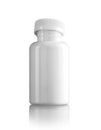 Almost closed white medicine bottle Royalty Free Stock Photo