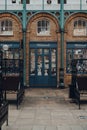 Closed Whittard shop and row of empty stalls inside Apple Market in Covent Garden Market, London, UK