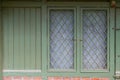 Closed window shutters in vintage design, classical architecture background Royalty Free Stock Photo