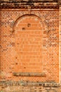 Closed windows in old orange old brick wall Royalty Free Stock Photo