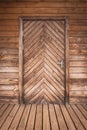 Closed wooden door of ecological wooden house