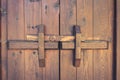 Closed wooden door with locking bar , vintage Royalty Free Stock Photo