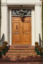 Closed wooden front door of an upscale home Royalty Free Stock Photo