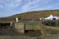 The closed wooden Inner storm Gates and Ram mechanism at Gourdon Harbour