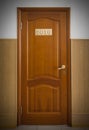 Closed wooden office door with Number 2016. Royalty Free Stock Photo