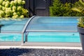 automatic retractable pool enclosure system to protect pool Royalty Free Stock Photo