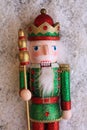 Closer photo of a Snow covered King nut cracker vertical format photograph