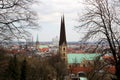 Closer view on the church steeple and the buildings around watched from the sparrenburg in bielefeld germany