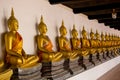 A closer view of row of statues of buddha