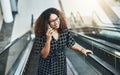 She closes good deals with just one phone call. High angle shot of an attractive young businesswoman taking a phonecall