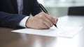 Closes up businessman hand signing document Royalty Free Stock Photo