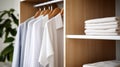 A closet with a rack of white shirts and folded towels, AI Royalty Free Stock Photo