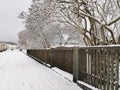 Closeu shot of a wooden fence in Larvik, Norway in winter Royalty Free Stock Photo