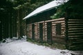 Closeup of an abandoned cottage in the snowy forest Royalty Free Stock Photo