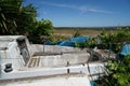 Closeup of an abandoned sailboat in a garden