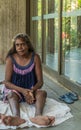 Closeup of Aboriginal woman sitting on floor, Darwin Australia