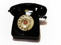 A vintage and antique telephone with white background.