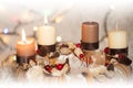 Closeup of Advent wreath with two burning candle and Christmas lights in background Royalty Free Stock Photo