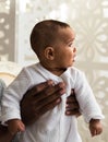 Closeup of African American curious baby boy looking away Royalty Free Stock Photo