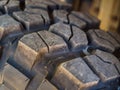 Closeup of aggressive offroad mud tire tread on 4x4