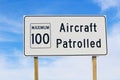 Closeup of an Aircraft Patrolled Sign with Maximum Speed Limit Royalty Free Stock Photo