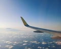 Closeup of airplane empennage with sunlight and blue sky in the background Royalty Free Stock Photo