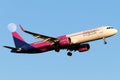 Closeup of an airplane taking off on the runway