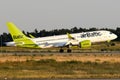 Closeup of an airplane taking off on the runway