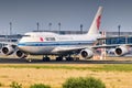 Closeup of an airplane taking off on the runway