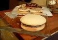 Closeup of Alfajores, a traditional Latin American sweets filled with Dulce de Leche served on glass plate