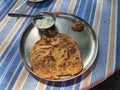 Aloo Paratha Indian Potato stuffed Flatbread. Served with fresh curd and tomato ketchup