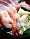 Closeup AMA EBI in sashimi set. Chef`s Choice: shrimp, engawa, tuna and hamachi Royalty Free Stock Photo