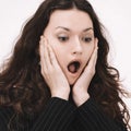 Closeup.amazed young business women.isolated on a white