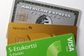 Closeup of Amex Platinum, MasterCard Gold and Visa Debit Royalty Free Stock Photo