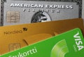 Closeup of Amex Platinum, MasterCard Gold and Visa Debit Royalty Free Stock Photo