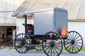 Closeup of Amish Buggy in front of barn in Pennsylvania USA