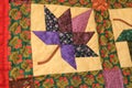 Close up Maple Leaf  Amish Handmade Quilt Royalty Free Stock Photo