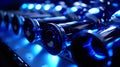 A closeup of the amplifiers s being adjusted creating a stunning contrast of blue lights against the dark stage