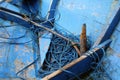 Closeup anchor in wooden fishing boat with selective focus