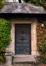 Closeup ancient entrance with vintage metal door