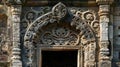 A closeup of an ancient stone doorway reveals intricate patterns and symbols hinting at the culture and customs of a