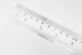 Closeup of angled stainless steel ruler Royalty Free Stock Photo