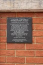Closeup Anne Frank Tree plaque at British Library, London, Great Britain