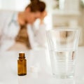 Closeup on antidepressant on table and doctor in background