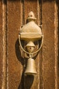 Closeup of antique bell on door Royalty Free Stock Photo