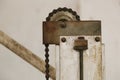 Closeup of an antique chain and pulley system