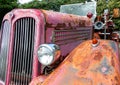 Closeup of an antique rusty fire engine truck transport on the streets