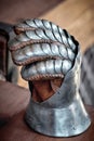 Closeup of an antique steel knight glove.