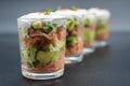 appetizers in little glasses on blakc background